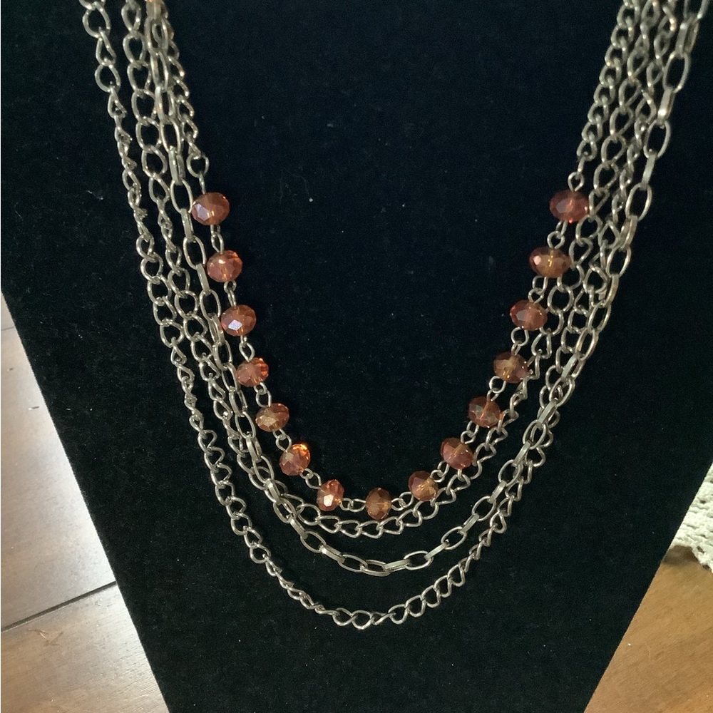 Silver tone Graduated Salmon Colored Beaded Necklace.